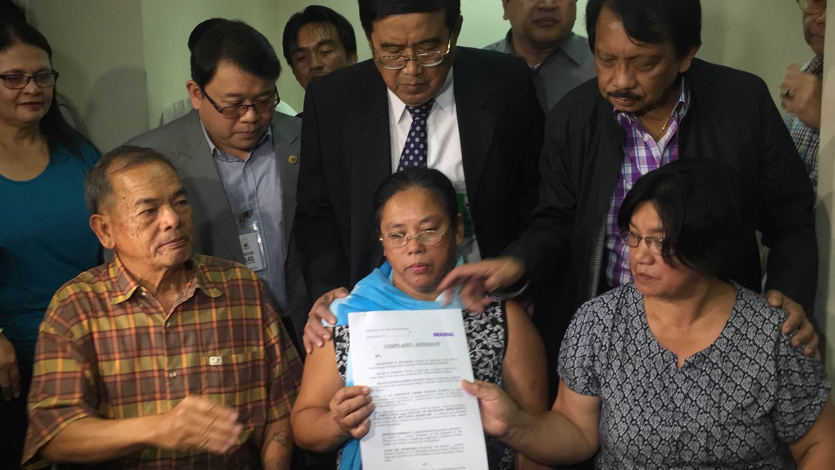 More relatives of the elite cops who were killed in the Mamasapano operation last year file a complaint of reckless imprudence resulting in multiple homicide against former president Aquino over the botched "Oplan Exodus." Photo by Marc Jayson Cayabyab