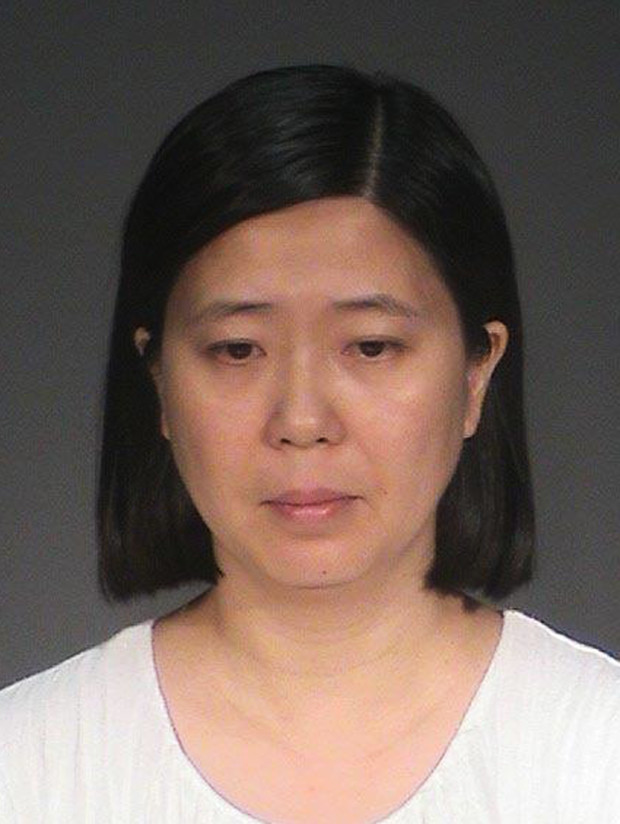 This photo provided by the Washington County Jail shows Lili Huang. The Minnesota woman, of Woodbury, is charged in Washington County with five felony counts, including labor trafficking, false imprisonment and assault. Huang remains in jail after making her initial court appearance Friday, July 15, 2016, the Star Tribune reported. (Washington County Jail via AP)