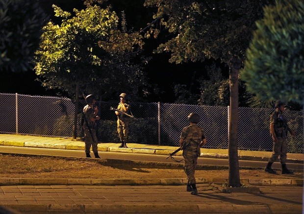Turkish soldiers are seen on the Asian side of Istanbul, Friday, July 15, 2016. A group within Turkey's military has engaged in what appeared to be an attempted coup, the prime minister said, with military jets flying over the capital and reports of vehicles blocking two major bridges in Istanbul. Prime Minister Binali Yildirim told NTV television: "it is correct that there was an attempt," when asked if there was a coup. AP 