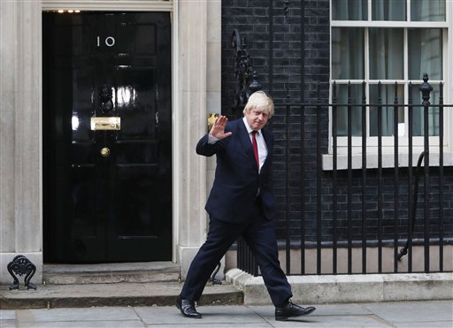 Boris Johnson leaves 10 Downing Street after being appointed Foreign Secretary, following a Cabinet reshuffle by new Prime Minister Theresa May, in London, Wednesday, July 13, 2016.  (Steve Parsons/PA via AP)