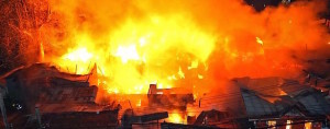 Fire hitting houses. (CDN FILE PHOTO/JUNJIE MENDOZA)