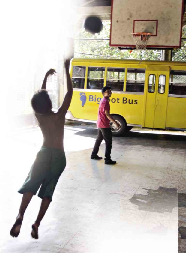 A WARD at Parian Drop-In Center, a shelter for homeless children in Cebu City, plays basketball with Stephen Dano (in red shirt), himself a former juvenile delinquent who was able to overcome drug addiction. CHRISTIAN MANINGO/CEBU DAILY NEWS