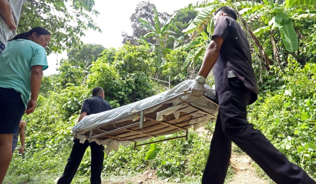 TABAMBAN DRUG LORD SHOT BY POLICE/JULY 07,2016:Funeral parlor attendant carry the remain of Ed Borces suspected drug lord shot and killed by Talamban police who raided his home in sitio San Jose Barangay Talamban.(CDN PHOTO/LITO TECSON)