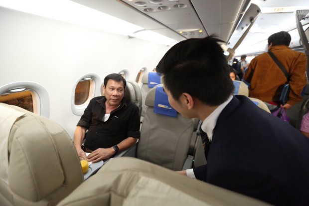 President Rodrigo Duterte takes  a commercial flight to Davao City. PHOTO FROM THE PRESIDENTIAL COMMUNICATIONS DEVELOPMENT AND STRATEGIC PLANNING OFFICE'S TWITTER PAGE