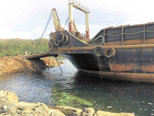 WATER in a small port being used by Cagdianao Mining Corp. to load nickel ore is a far cry from turbid coastal waters in other mining areas in the region.       DANILO V. ADORADOR III