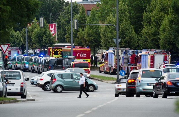 Police and firefighters near a shopping mall on July 22, 2016 in Munich, where several people were killed in a shooting rampage by a lone gunman (AFP Photo/Matthias Balk)