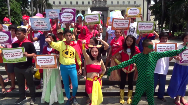Members of militant groups don superhero costumes to protest President Rodrigo Duterte's plan to grand former president Ferdinand Marcos hero's burial. RYAN LEAGOGO/INQUIRER.net