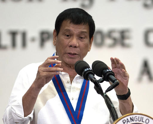 FILE - In this Wednesday, Aug. 17, 2016 file photo, Philippine President Rodrigo Duterte gestures as he talks during the 115th Police Service Anniversary at the Philippine National Police headquarters in Manila. The Philippines' brash-talking president has threatened to withdraw his country from the United Nations in his latest outburst against critics of his anti-drugs campaign that has left hundreds of suspects dead. Duterte ridiculed the U.N. as inutile, and lashed at U.S. police killings of black men. (Noel Celis/Pool Photo via AP, File)