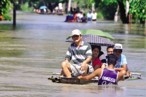 Flooding in Calasiao, Pangasinan (FILE PHOTO BY WILLIE LOMIBAO/ INQUIRER NORTHERN LUZON)