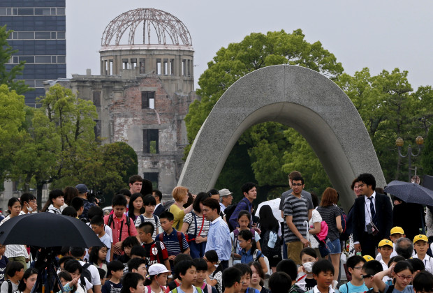 FILE - In this May 26, 2016 file photo,  people visit the Hiroshima Peace Memorial Park in Hiroshima, Hiroshima Prefecture, southern Japan.  Hiroshima city has asked the developer of “Pokemon Go” to remove the atomic bomb memorial park as a “gym” location in the popular smartphone game. The city made the request Tuesday, July 26, 2016. It is asking game developer Niantic Inc. to delete the park from the game by Aug. 6, when an annual ceremony is held to remember those who died in the 1945 bombing.(AP Photo/Shuji Kajiyama, File)