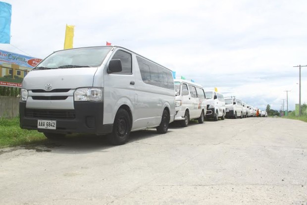 EIGHTEEN impounded vehicles from Metro Manila were transferred to Tarlac City on Thursday (Aug. 11). Most of them were white vans used as passenger vans. Some of the vehicles were in poor running condition. One vehicle broke down and had to be towed. (PHOTO CONTRIBUTED BY HOMER TEODORO)
