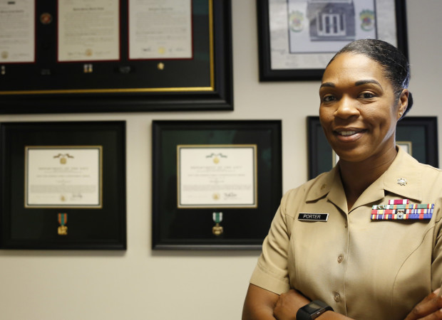 In this Aug. 5, 2016 photo, Maj. Shanelle Porter, commanding officer at the Recruiting Station Chicago poses in her office in Des Plaines, Ill. The U.S. Marine Corps is looking for a few more good women. And this time the campaign’s a bit different. Marine recruiters are turning to girls high school sports teams to find candidates who may be able to meet the Corps’ rigorous physical standards _ including for front-line combat jobs now open to women. (AP Photo/Tae-Gyun Kim)