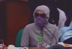 Mary Rose Aquino testifies during a Senate inquiry on Aug. 22, 2016, how her parents -- both police assets and re-sellers of seized shabu -- were kidnapped and murdered by members of the Antipolo City police. (SCREENSHOT OF INQUIRER.NET VIDEO/ MAILA AGER)