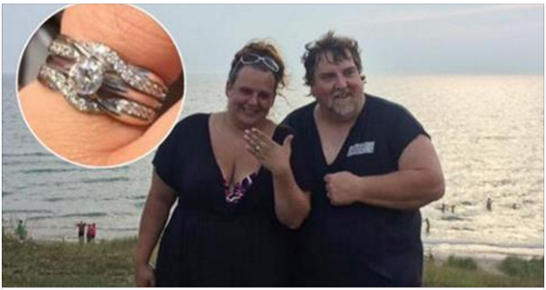 John Dudley (right) poses with Jamie Kennedy after he recovered her wedding ring (inset) from the bottom of Lake Michigan. Kennedy described the recovery as a 'miracle' and thanked Dudley for his generosity. PHOTO COURTESY OF JOHN R. DUDLEY