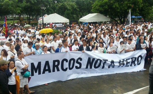 Martial law victims, lawmakers, artists, civil society groups, religious groups, students and concerned citizens gather on a rainy Sunday morning at the Luneta Park in Manila to appeal to Duterte to reconsider his decision to allow the burial of late dictator Ferdinand Marcos at the Libingan ng mga Bayani. TARRA QUISMUNDO / PHILIPPINE DAILY INQUIRER