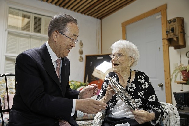 UN Secretary-General Ban Ki-moon presents his 99-year-old "American Mom" Libba Patterson with a engraved silver platter before lunch at her home Thursday, Aug. 11, 2016, in Novato, Calif. The two became acquainted when Patterson and her family hosted the future UN chief on his first trip to the United States, when he was 18. Patterson had tears in her eyes when she spoke about how the teenage "Ki-moon" became her fourth child and part of her family during his eight-day visit in 1962. When Ban is on the west coast he tries to visit Patterson at her home north of San Francisco. AP