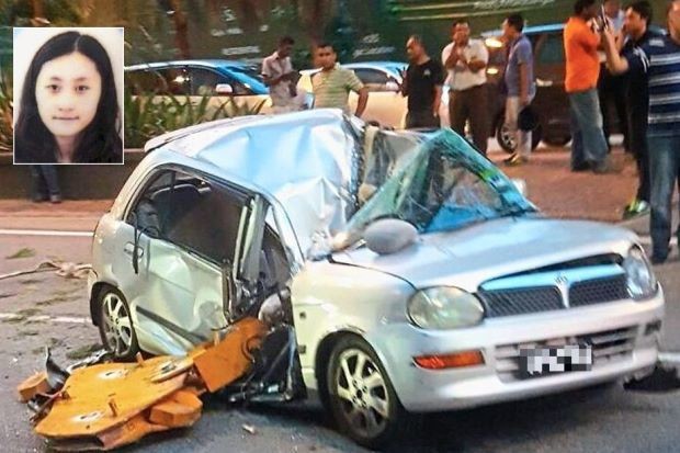 Chin Khoon Sing (inset) was killed instantly when part of a crane fell onto her car along Jalan Raja Chulan in Kuala Lumpur. Photo from The Star Online/Asia News Network.
