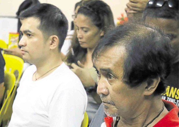 SURRENDER Cerilo “Athel” Alcala, brother of Quezon Rep. Vicente Alcala, and his son Sajid show up at the police station in Lucena City to refute allegations that they are involved in drug trafficking in the province. DELFIN T. MALLARI JR./INQUIRER SOUTHERN LUZON