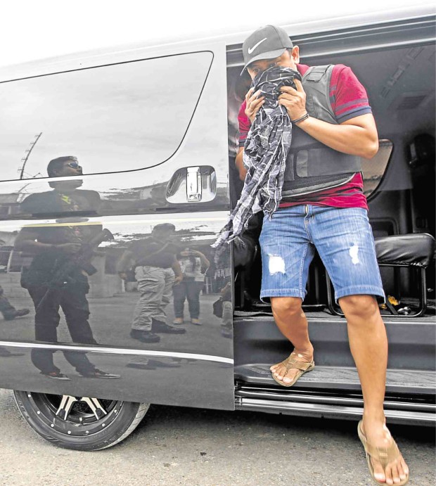 DRUG lord Alvaro “Barok” Alvaro during his surrender to the Cebu provincial police station in June.