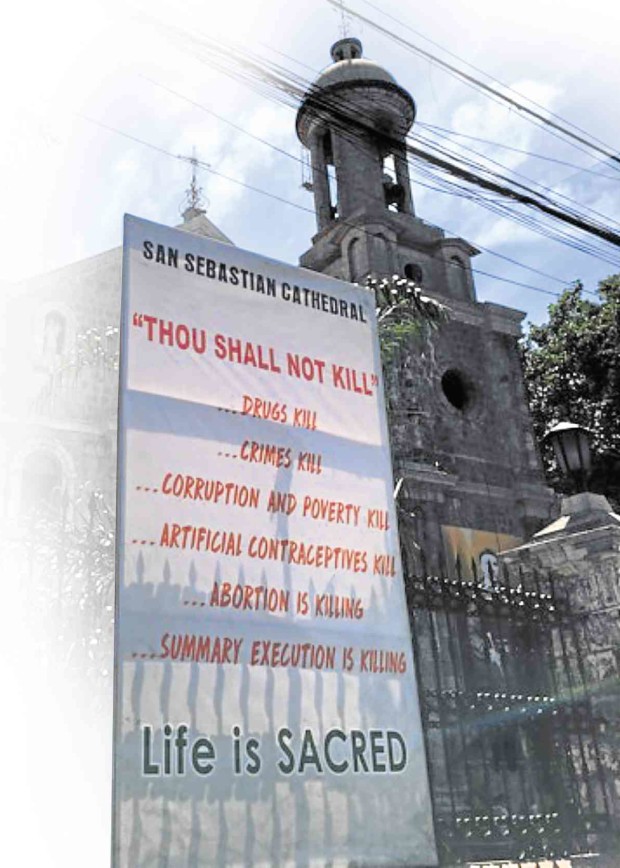 THE DIOCESE of Bacolod started displaying this tarp at the San Sebastian Cathedral in Bacolod City in protest of what Church leaders said is a “culture of death.”           CARLA P. GOMEZ/INQUIRER VISAYAS