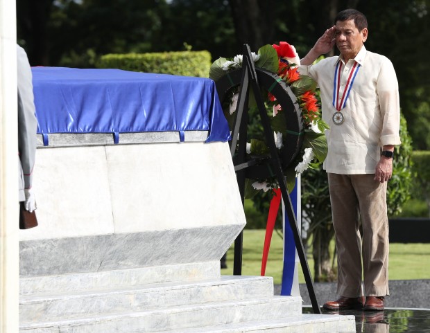 August 29 2016 President Rodrigo Duterte salutes before the tomb the unknown soldier's monument during National Heroes Day rites at the Libingan ng mga Bayani in Taguig City. INQUIRER/ MARIANNE BERMUDEZ
