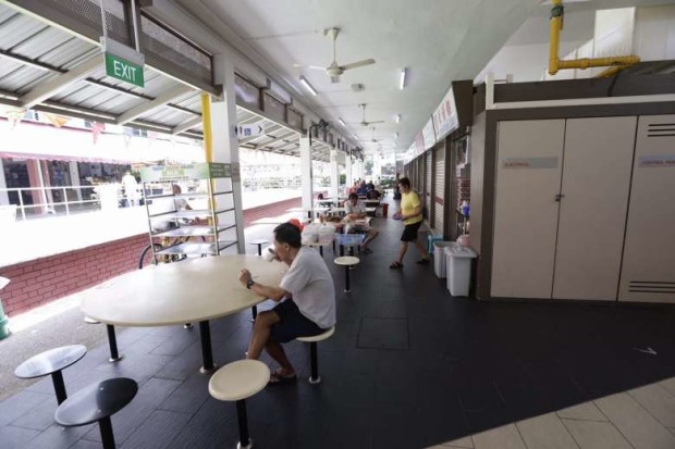 Empty seats are seen at Macpherson Market and Food Center at about 12:30 pm on Aug 31, 2016. STRAITS TIMES PHOTO: KEVIN LIM/ASIA NEWS NETWORK