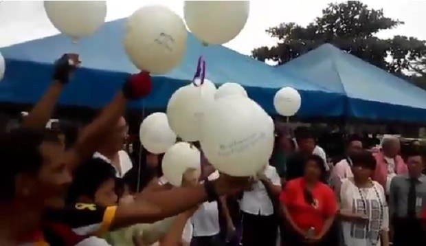 White balloons were released after road rage victim Mark Vincent Garalde was laid to rest. SCREENGRAB FROM RADYO INQUIRER 990'S TWITTER VIDEO 