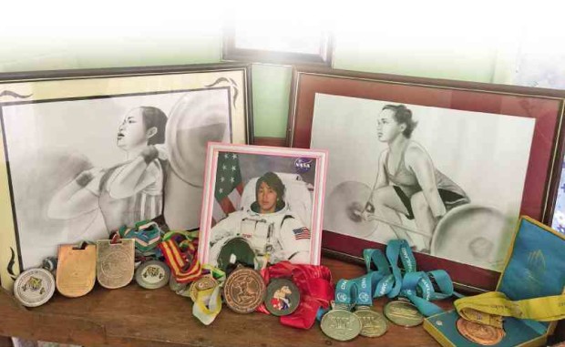 A CORNER at the Diaz family home in Zamboanga City is filled with mementos of Hidilyn Diaz, including medals she had won in sports competitions since she was 12 years old.       JULIE ALIPALA-INOT/INQUIRER MINDANAO