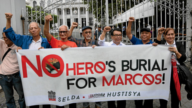 Martial law victims led by Rep. Neri Colmenares turn to the Supreme Court in their bid to scuttle a Duterte administration plan to bury the late dictator Ferdinand Marcos at Libingan ng mga Bayani. MARIANNE BERMUDEZ/INQUIRER FILE PHOTO