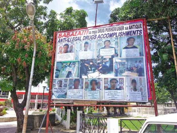 THIS SIGNBOARD, featuring photographs of detained suspected drug pushers and users, at the plaza of San Jose town in Antique province has since been covered after the Commission on Human Rights said this violated the rights of the suspects. ALBERT MAMORA/CONTRIBUTOR