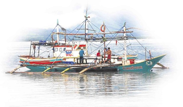 FISHERMEN from Subic, Zambales, prepare their boats for another fishing trip to Scarborough Shoal moments after the Permanent Court of Arbitration in The Hague favored the Philippines on its territorial dispute with China. ALLAN MACATUNO/INQUIRER CENTRAL LUZON