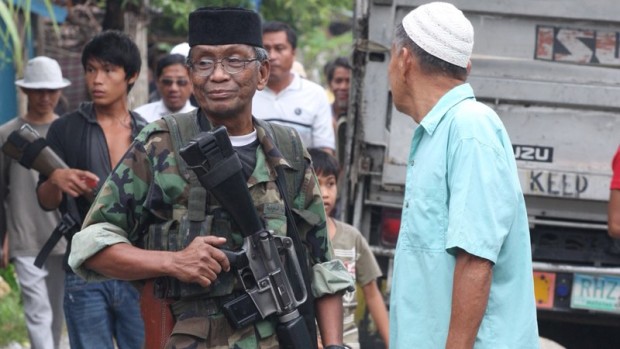 BIFF spokesperson Abu Misri Mama is shown in this undated photo carrying an assault rifle. INQUIRER FILE