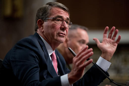 In this Sept. 22, 2016 file photo, Defense Secretary Ash Carter, accompanied by Joint Chiefs Chairman Gen. Joseph Dunford, testifies on Capitol Hill in Washington before the Senate Armed Services Committee hearing. The U.S. is sending 615 more troops to Iraq as the stage is set for an Iraqi-led battle to reclaim Mosul, the northern city that has been the Islamic State group's main stronghold for more than two years. AP