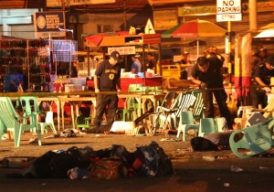 Crime scene investigators process the bombed night market outdoor restaurant in Davao City. Fourteen people were killed and dozens were wounded in the first bombing attack on a civilian area under the Duterte administration.  The Abu Sayyaf has been blamed for the attack. (AP FILE PHOTO)