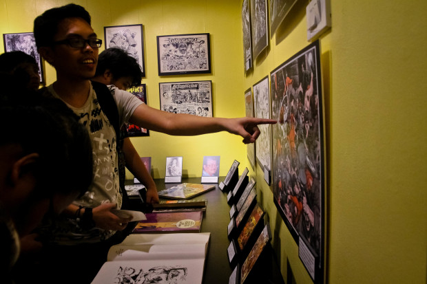 Guests view a display of comic books and other artworks during the opening of the Komikero Komiks Museum in San Pablo City, Laguna. KIMMY BARAOIDAN