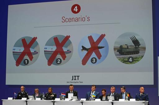 The possible scenarios into the downing of Malaysia Airlines jetliner flight MH17 are put on display during a press conference by the Joint Investigation Team (JIT) on the preliminary results of the investigation in Nieuwegein, Netherlands, Wednesday, Sept. 28, 2016. The disaster claimed 298 lives. (AP Photo/Peter Dejong)