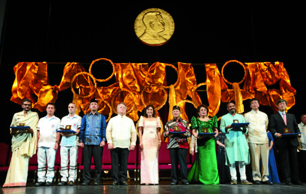  Vice President Leni Robredo (6th from left) and Ramon del Rosario (5th from left) poses with the winners of the Ramon Magsaysay awards (L-R) Thodur Madabusi Krishna (India), representative of Vientianne Rescue (Laos), representative of Dompet Dhuafa (Indonesia), Conchita Carpio Morales (Philippines), Bezwada Wilson (India) and representative of Japan Overseas Cooperation (Japan) during awarding ceremony at the Cultural Center of the Philippines on Wednesday, August 31, 2016. INQUIRER PHOTO / GRIG C. MONTEGRANDE