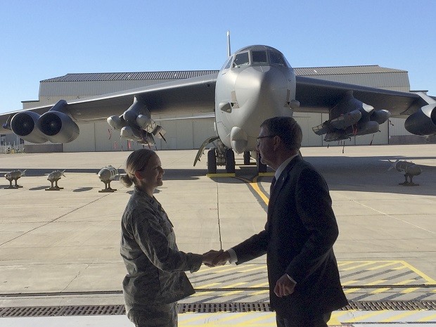 Defense Secretary Ash Carter greets airmen at Minot Air Force Base, N.D., Monday, Sept. 26, 2016, after giving a speech on nuclear weapons. Carter says the Pentagon is committed to correcting what he calls decades of shortchanging its nuclear forces. Carter spoke Monday at a nuclear missile and bomber base in Minot. He says $108 billion is earmarked for sustaining and improving the forces over the next five years. (AP Photo/Robert Burns)