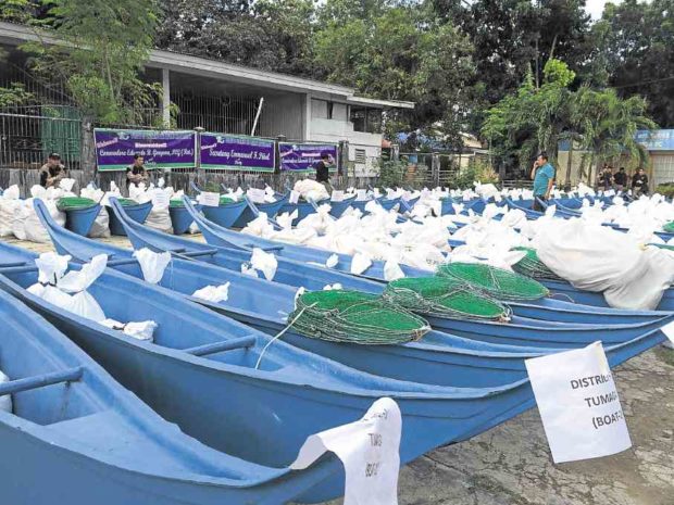 SOME of the boats distributed by the Department of Agriculture to Badjao fishermen in Zamboanga City. The DA aims to distribute at least 20,000 boats to fishermen nationwide this year. Its target is to distribute 200,000 more boats next year. JULIE S. ALIPALA/INQUIRER MINDANAO