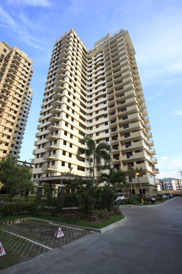 The Cypress Tower condominium in Taguig. PHOTO FROM DMCI's website