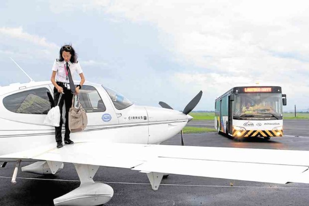 JULIE Wang lands her plane at Clark International Airport.     CONTRIBUTED PHOTO