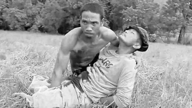LAND REFORM FATALITY  Arnel Figueroa, a leader of Pesante in Coron, dies in the arms of another farmer after he was shot by a security guard of the Bureau of Animal Industry. The incident was captured on a cell phone video by Pesante’s general secretary. CONTRIBUTED PHOTO