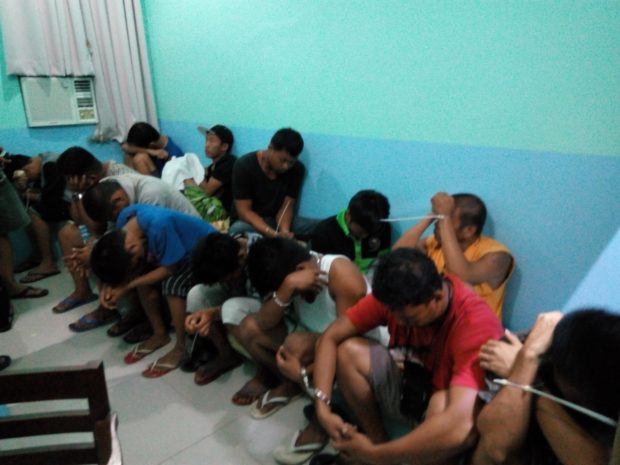 Sixteen men are arrested by agents of National Bureau of Investigation-Bohol in a sell-bust operation early Saturday morning in Tagbilaran City. LEO UDTOHAN/INQUIRER VISAYAS
