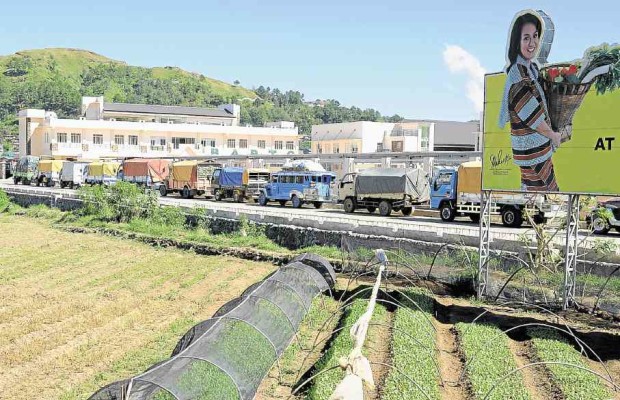 WIDE parking spaces are some of the attractions of the government’s Benguet Agri-Pinoy Trading Center in this photograph taken during the facility’s 2015 soft launch. It continues to serve truckers, but farmers have not been selling crops there due to a dispute. PHOTOS BY EV ESPIRITU/INQUIRER NORTHERN LUZON