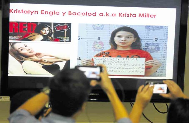 ‘ONSCREEN’ TROUBLES. The actress Krista Miller as presented by the QCPD to the media following her arrest. NIÑO JESUS ORBETA