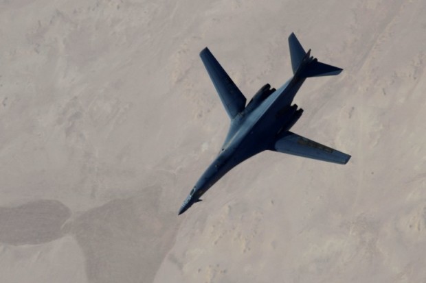 In this September 27, 2014 US Air Force handout photo, a B-1B Lancer disengages from a KC-135 Stratotanker after refueling after airstrikes on Islamic State jihadists in Syria. The B-1B Lancer was part of a strike package that engaged in strikes in Syria on October 8, 2014.    AFP PHOTO / Handout  / US Air Force /  Staff Sgt. Ciara Wymbs / AFP PHOTO / US AIR FORCE / Staff Sgt. Ciara Wymbs