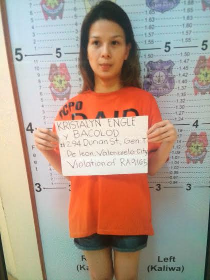 Krista Miller poses for her mugshot (Photo from the Quezon City Police District)