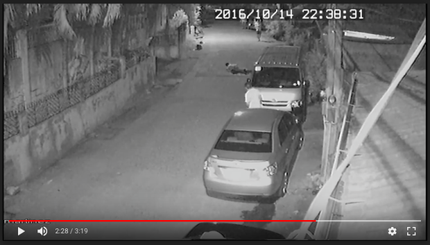 ROBBERY MURDER:  A screenshot of a barangay CCTV footage shows 18-year-old Nick Russel Oniot bleeding to death on the ground after he is stabbed by two robbers on Oct. 14, 2016 (SCREENSHOT COURTESY OF THE TAGUIG CITY POLICE)