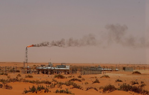 A flame from a Saudi Aramco oil installion known as "Pump 3" is seen in the desert near the oil-rich area of Khouris, 160 kms east of the Saudi capital Riyadh, on June 23, 2008. Oil producers are at war with speculators but they have been left speculating themselves over the future of their precious commodity after a unique summit, analysts said. Government ministers and traders alike are anxiously waiting to see which way prices go in coming weeks after Sunday's summit of consumers and producers, which Saudi Arabia called in response to the doubling of the cost of a barrel of oil over the past year to almost 140 dollars.      AFP PHOTO/MARWAN NAAMANI