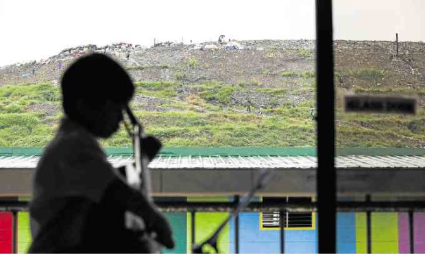 The “hills”—or the Payatas landfill in the background—are alive with the sound of Sparrow Music. —PHOTOS BY LYN RILLON